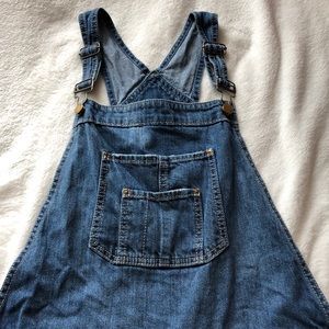 American Rag distressed denim overalls.